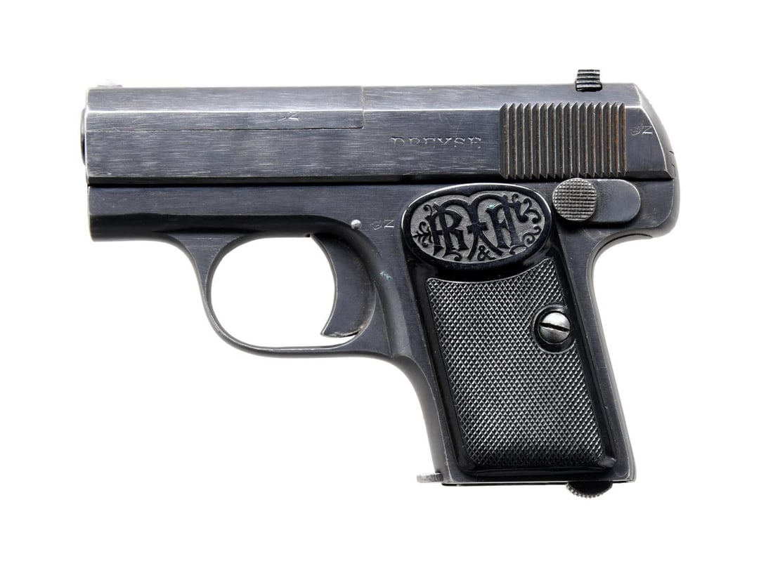 DREYSE VEST POCKET SEMI-AUTOMATIC PISTOL.: Cal. 25 ACP. S# 58583. Bbl. 2 1/8". Semi-automatic vest pocket pistol mfg. by Dreyse. The left side of the slide is marked "DREYSE", with Crown/N commercial nitro proofs present overall. Metal compone