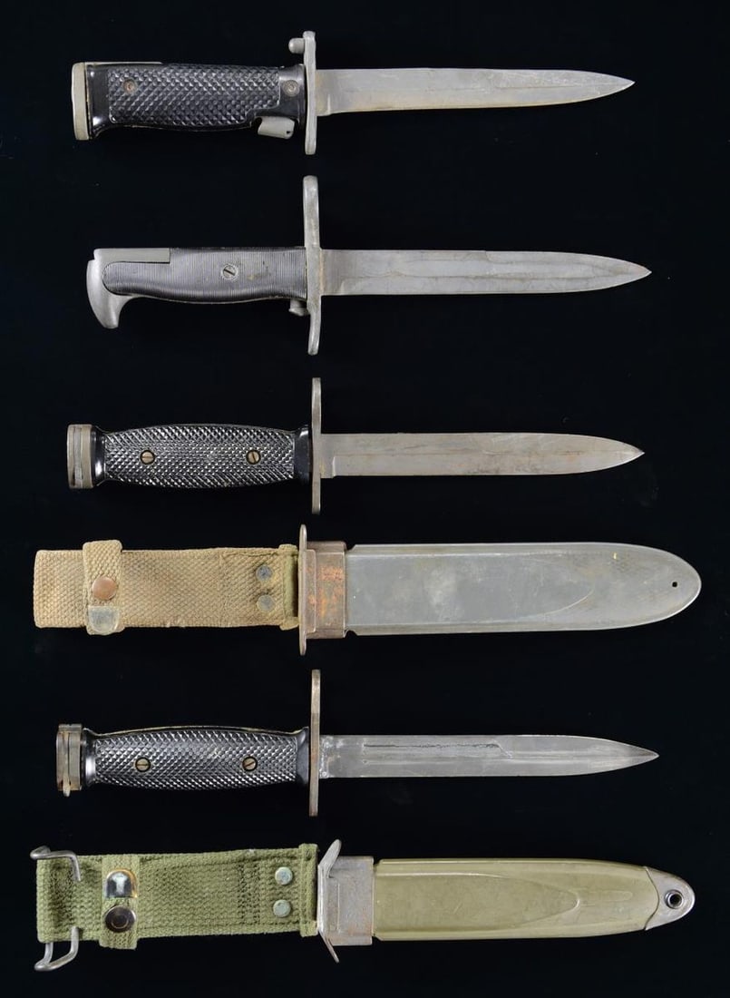 4 US BAYONETS.: This lot includes 1 M1 Garand bayonet with a 6 1/2" blade, no scabbard. / 1 M5A1 bayonet by Imperial, with a 6 1/4" blade, no scabbard. / 1 M4 bayonet by Imperial, with a 6 1/2" blade in a USN scabbar