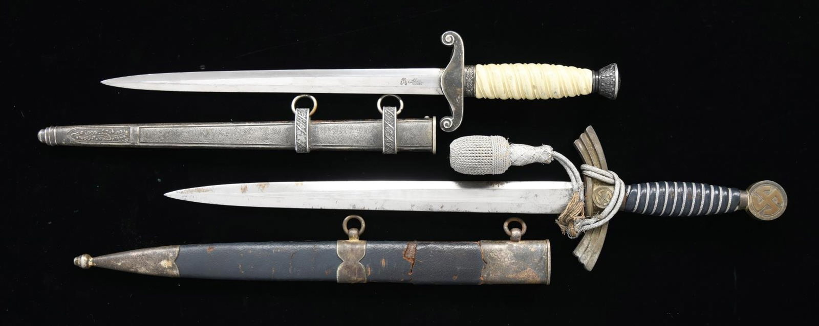 WWII GERMAN 1st MODEL LUFTWAFFE DAGGER & ARMY: DAGGER. 1) LUFTWAFFE. Overall length: 19 1/2". Plain 6-facet blade marked “(storks) ROBT KLAAS SOLINGEN”. Plated crossguard & pommel showing classic gilded mobile party symbol. Aluminum wire-w