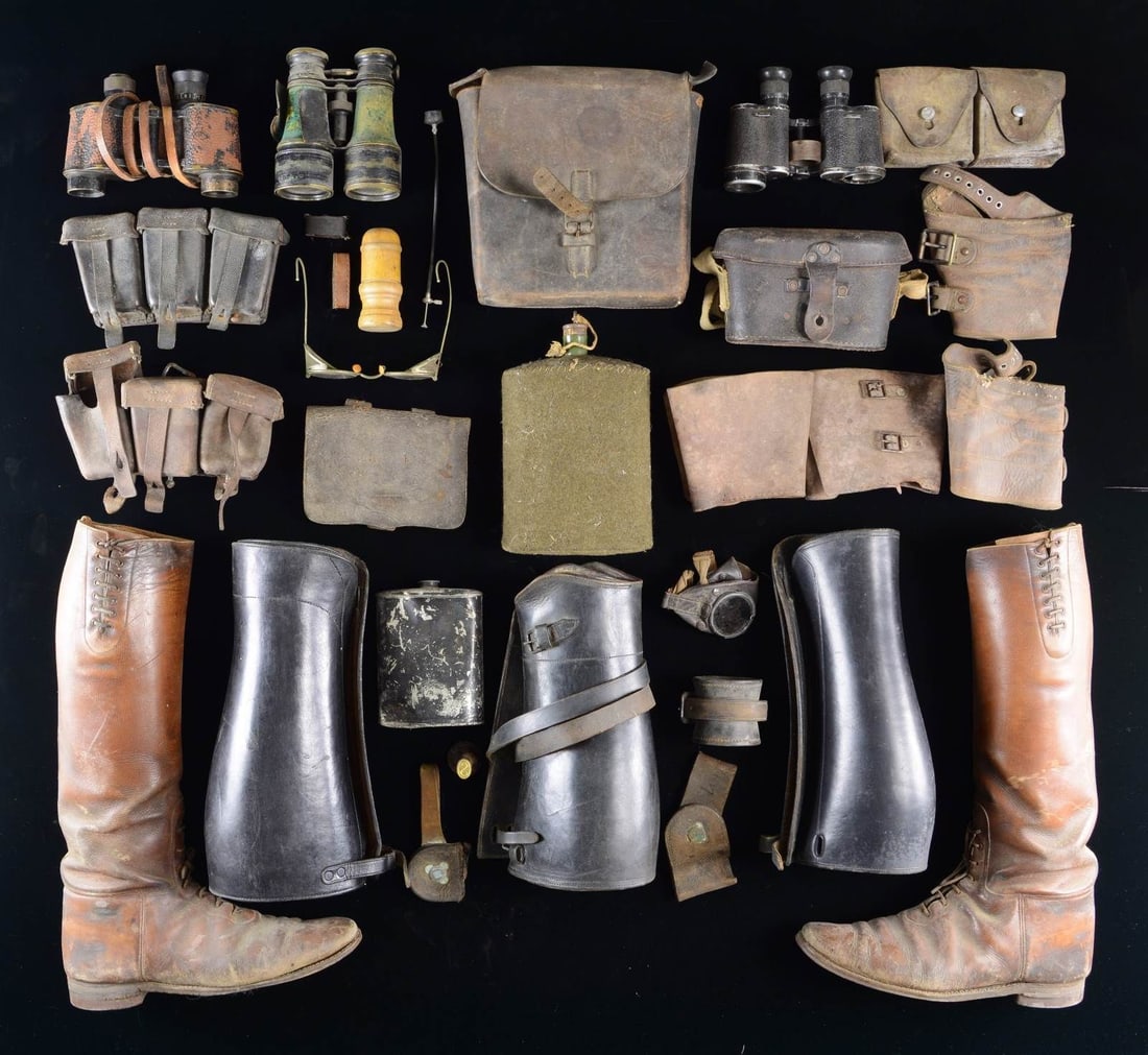 ASSORTED MILITARIA FROM 1860 TO WWII, INCLUDING: LEATHER BOOTS, PUTTEES, FIELD EQUIPMENT, BINOCULARS, & MORE. This lot includes 1 pair of 18” brown leather boots that are identified to 2nd Lieutenant Pynn of the 373rd Aero Squadron. / 3 Pairs 