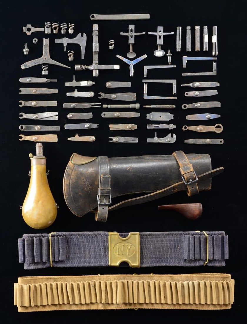US MILITARY GUN TOOLS, 2 CARTRIDGE BELTS, A: CARBINE BOOT, & MORE. This lot includes 7 bullet extractors. / 2 Spring vices. / 25 Various folding combination tools for rifles & muskets. / 20 Assorted tools for a variety of rifles & muskets. / 1 M