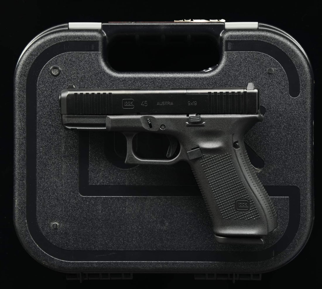 GLOCK 45 SEMI AUTO PISTOL.: Cal. 9x19. S# BUVV820. Bbl. 4". Standard white outline Glock sights. Slide has cut for RMR plate for reflex sight mounting. Austrian made Glock 45. Matte black finish. Polymer frame w/ accessory rail.