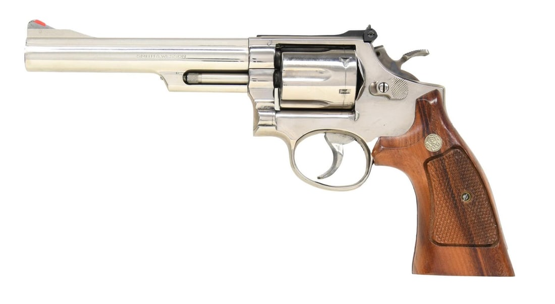SMITH & WESSON MODEL 19-3 DA REVOLVER.: Cal. 357 Mag. S# 4K81738. Bbl. 6" pinned. Serrated ramped blade front sight w/ orange insert. Adjustable rear sight. Mfg. 1974. Nickel finish w/ case colored target hammer. Target trigger appears poli
