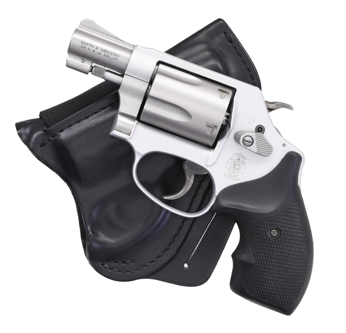 SMITH & WESSON MODEL 637-2 DA REVOLVER.: Cal. 38 Spl. S# DBN9737. Bbl. 2". Serrated ramped blade front sight. Fixed rear sight. 5-shot cyl. Stainless finish w/ case colored trigger & hammer. Black hard rubber finger groove grips. UNATTACHED