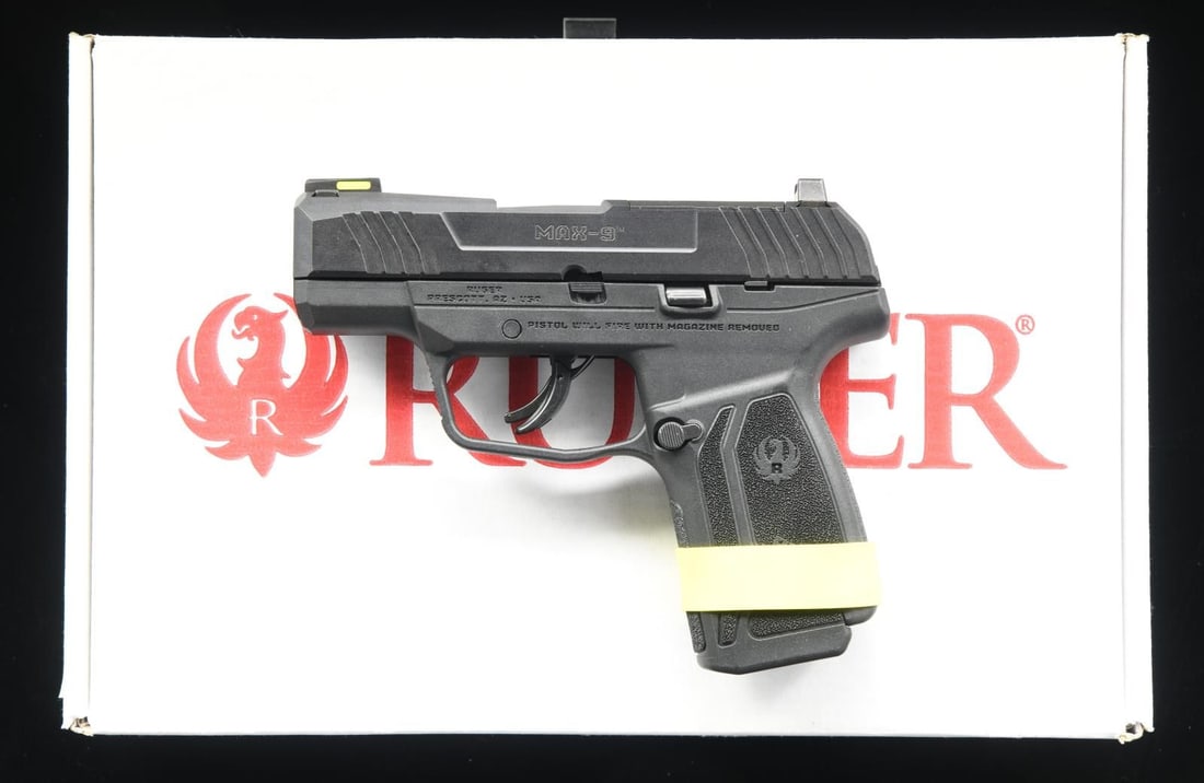 RUGER MAX-9 MODEL SEMI-AUTO PISTOL.: Cal. 9mm Luger. S# 350034245. Bbl. 3.2". Mfg. 2021 as Model 03503, having black oxide finish. No snag contours on slide, having front & rear cocking grooves, plus machined for co-witness optical sight