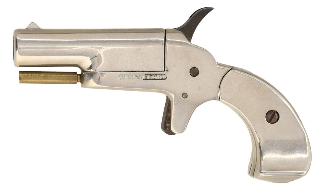TALON PERC SINGLE SHOT DERRINGER PISTOL.: Cal. 38. NSN. Bbl. 2 3/8". Blade front sight. Chrome finish. 20th century made percussion derringer style pistol. CONDITION: metal shows scattered light scratches, handling wear & some light oxidation