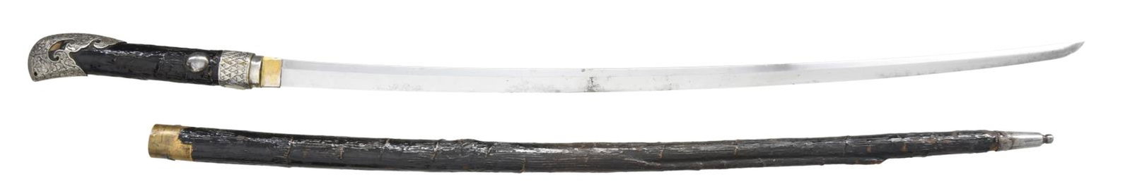 SOUTHEAST ASIAN SWORD.: Overall length: 40 1/2". Blade length: 29 7/8". This interesting sword appears to be of Southeast Asian origin and utilizes a katana blade. The blade does not exhibit a visible temper line, but the ha