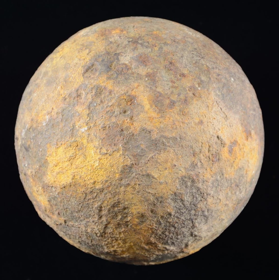 CANNONBALL FOR A 12-POUND CANNON.: This Civil War era cannonball has a diameter of about 4.4" and was fired from, what is commonly called, a 12-pound cannon. CONDITION: cannonball is excavated and has a red/brown, somewhat crusty patin