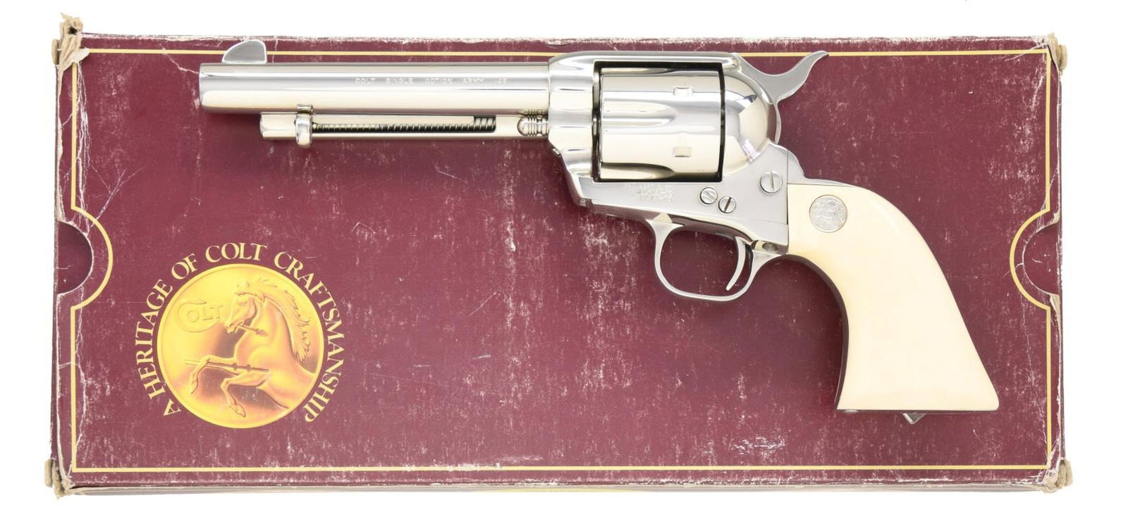 COLT 3RD GEN NICKEL SAA REVOLVER WITH BP FRAME AND: IVORY GRIPS. Cal. 45 Colt. S# SA71684. Bbl. 5 1/2" with blade sight; frame notched rear. Mfg. 1990 with black powder style frame, bullseye ejector rod head and ivory grips having silver rampant Colt m