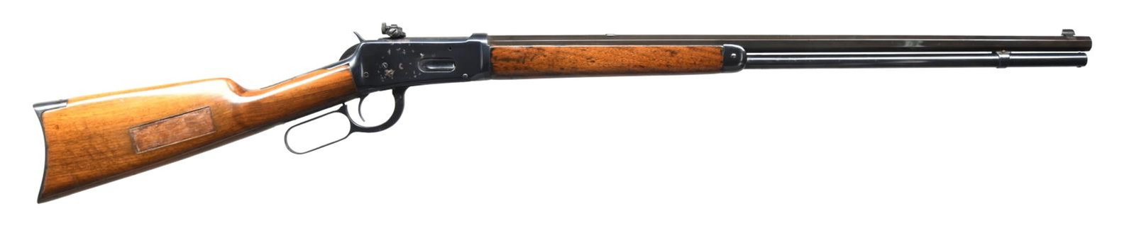 WINCHESTER MODEL 1894 LEVER ACTION RIFLE.: Cal. 30 WCF. S# 514140. Bbl. 26". Model 1894 lever action rifle. Mfg. by Winchester in 1910. The left flat of the octagonal bbl. is marked w/ Winchester's 2 line address & the cal. designation marked 