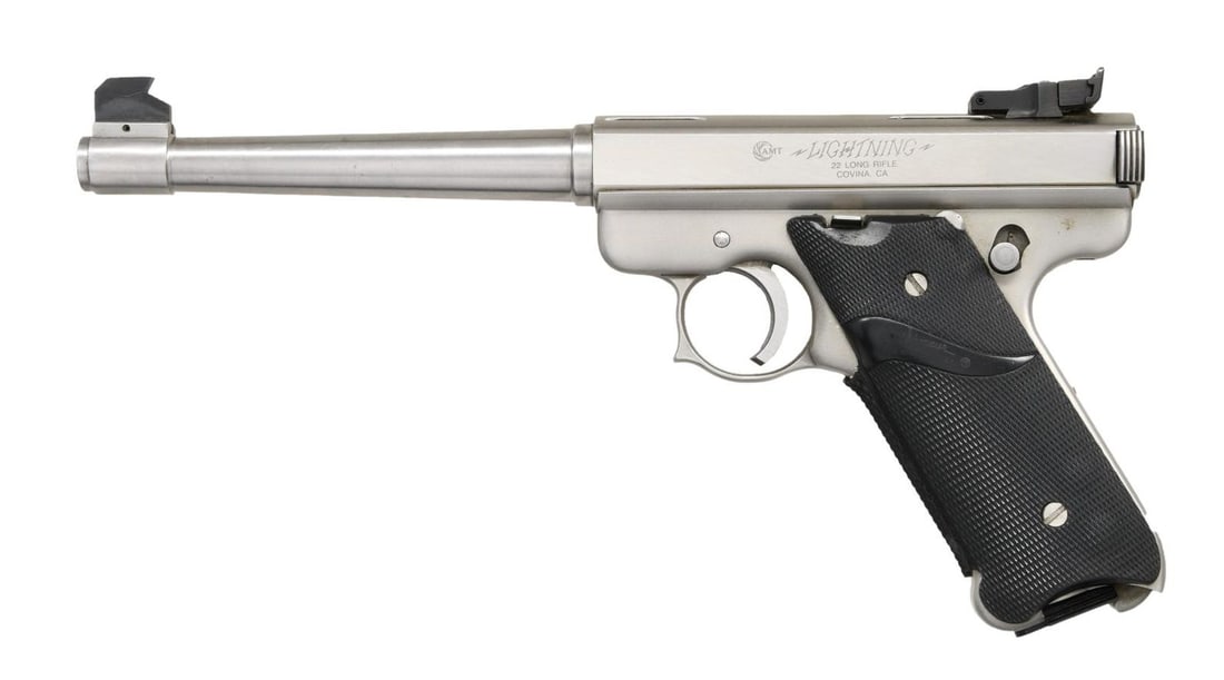 AMT LIGHTNING SEMI AUTO PISTOL.: Cal. 22 LR. S# G21218. Bbl. 6 1/2". Tall blade front sight. Adjustable rear sight. Slide is grooved for scope mounting. Mfg. 1984-87. Stainless finish. Pachmayr Signature grips. MAGS: 1-10 rd. CONDITI