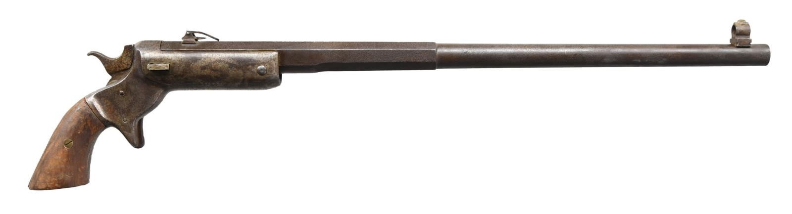 STEVENS NEW MODEL POCKET RIFLE.: Cal. 22 LR. S# 2732. Bbl. 18 1/8". New Model Pocket Rifle mfg. by Stevens. The left quarter flat of the half octagonal bbl. is marked with Steven's mfg. information. Metal components exhibit a dark gr