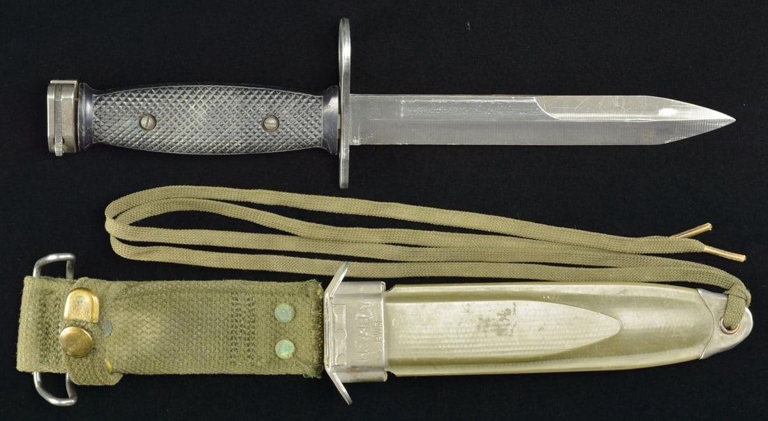 VIETNAM ERA US M7 BOC BAYONET.: Mfg. between 1968-1970 w/ M8A1 PHW scabbard. CONDITION: good overall w/ blade showing friction wear, verdigris on rivets & snaps. (02-17931/MD). $75-125.