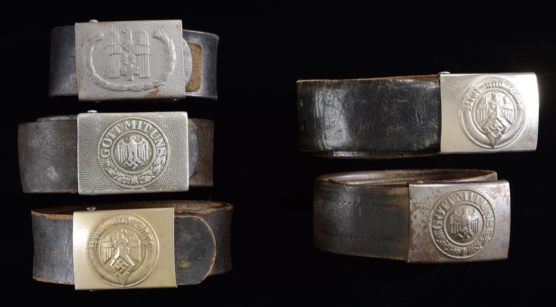 5 WWII GERMAN BELT BUCKLES WITH ORIGINAL BELTS.: This belt lot consists of 1 army belt buckle in aluminum and a leather belt with an aluminum keeper. / 1 Army belt buckle in steel and a leather belt with aluminum keeper. / 2 HJ belt buckles in steel