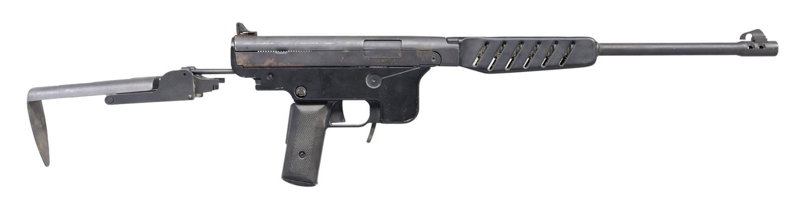 DEMRO XF-7 WASP SEMI-AUTOMATIC CARBINE.: Cal. 9x19mm Parabellum. S# 052394. Bbl. 17". XF-7 Wasp semi-automatic carbine mfg. by Demro Products. Left side of receiver exhibits markings stipulating Demro's mfg. information, the model and cal. d