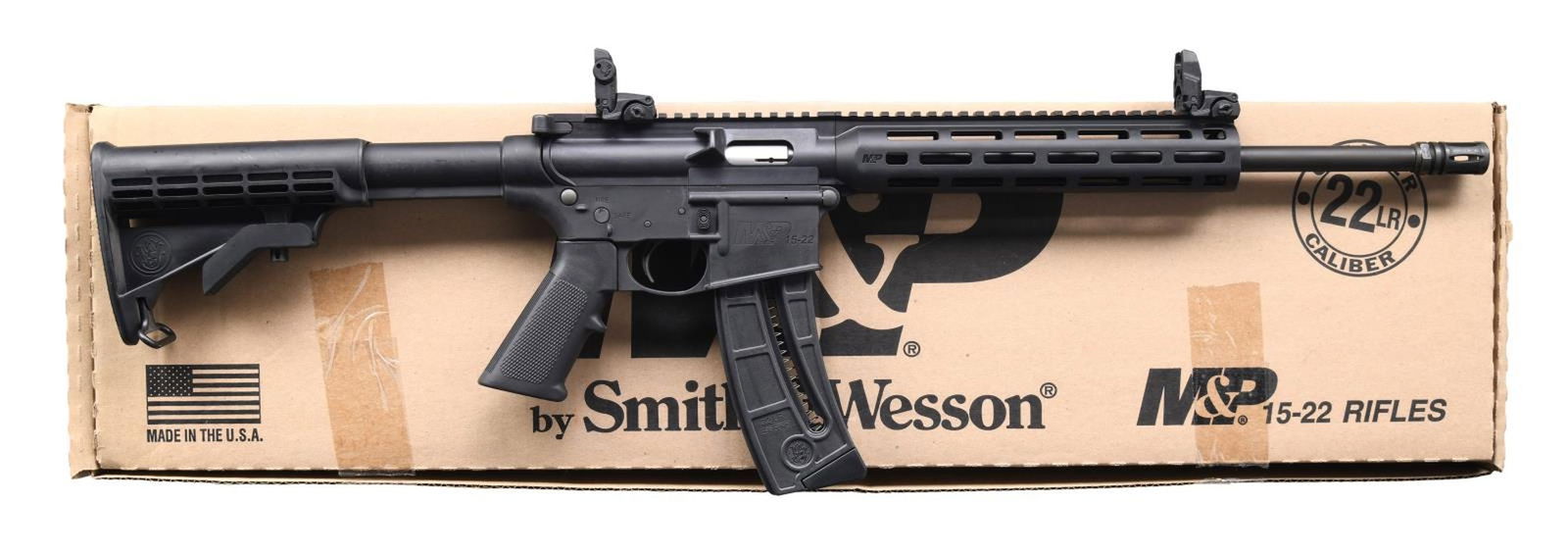 SMITH & WESSON M&P15-22 SPORT SEMI-AUTOMATIC RIFLE: WITH MATCHING FACTORY BOX. Cal. 22 LR. S# LAB8277. Bbl. 16 1/2". M&P15-22 Sport semi-automatic rifle mfg. by Smith & Wesson. Receiver exhibits standard factory markings on either side. Black polymer r