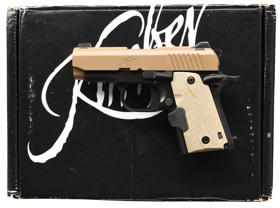 KIMBER MICRO 9 SEMI AUTO PISTOL.: Cal. 9mm Luger. S# TB0015754. Bbl. 3". Three-dot sights. Desert tan finished slide. Balance of other parts have matte black finish. Tan Crimson Trace lasergrips w/ laser that does not appear to be tur
