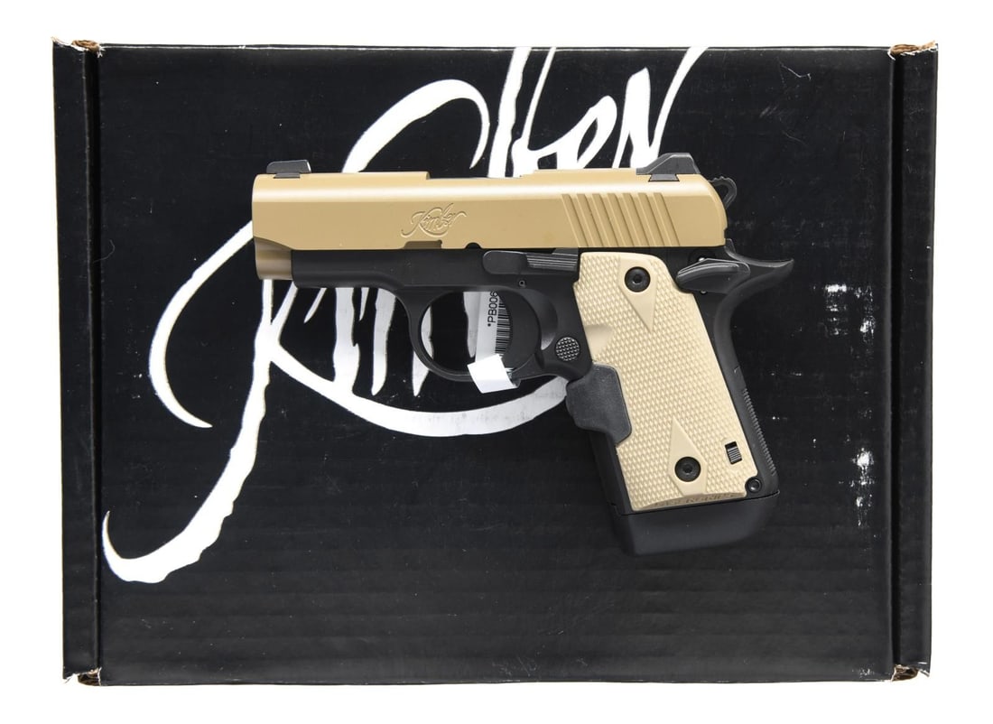 KIMBER MICRO-9 SEMI AUTO PISTOL.: Cal. 9mm Luger. S# PB0061895. Bbl. 3". Three-dot sights. Desert tan finished slide. Matte black frame. Crimson Trace grips that do not appear to work & may need batteries. Factory hang tag present on