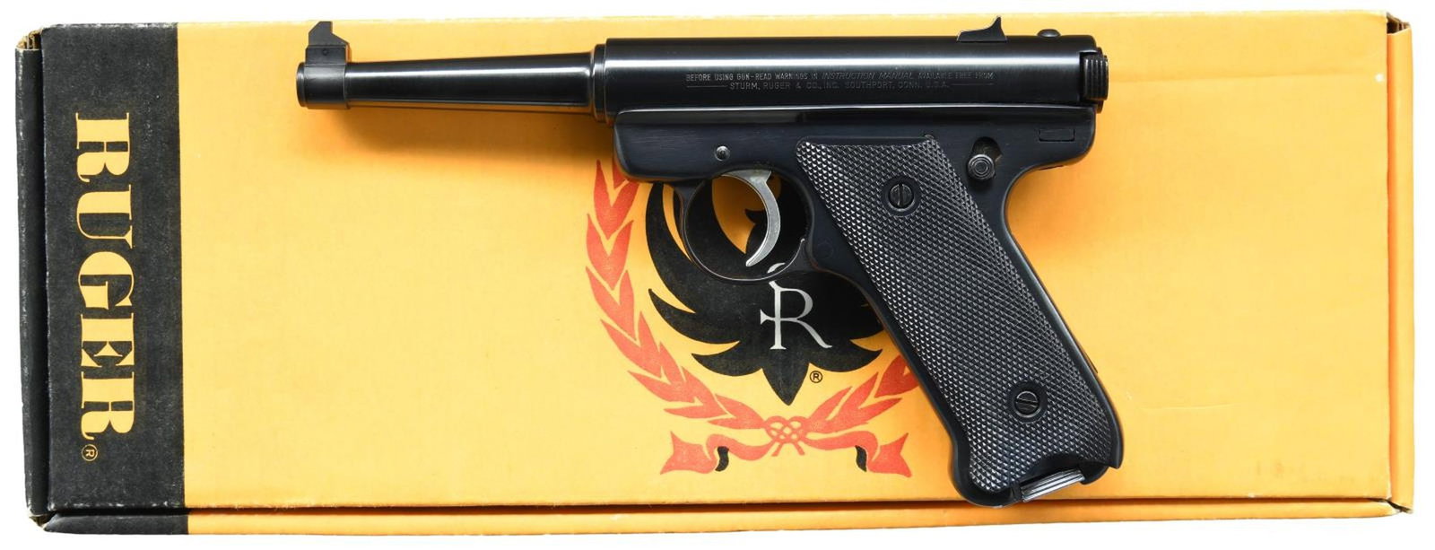 RUGER STANDARD AUTO SEMI-AUTO PISTOL.: Cal. 22 LR. S# 17-57980. Bbl. 4 3/4" with Patridge blade; windage drift adjustable rear. Mfg. 1981 (1949-1982) as blued RST-4, having checkered black plastic grips with silver eagle medallion, plus si