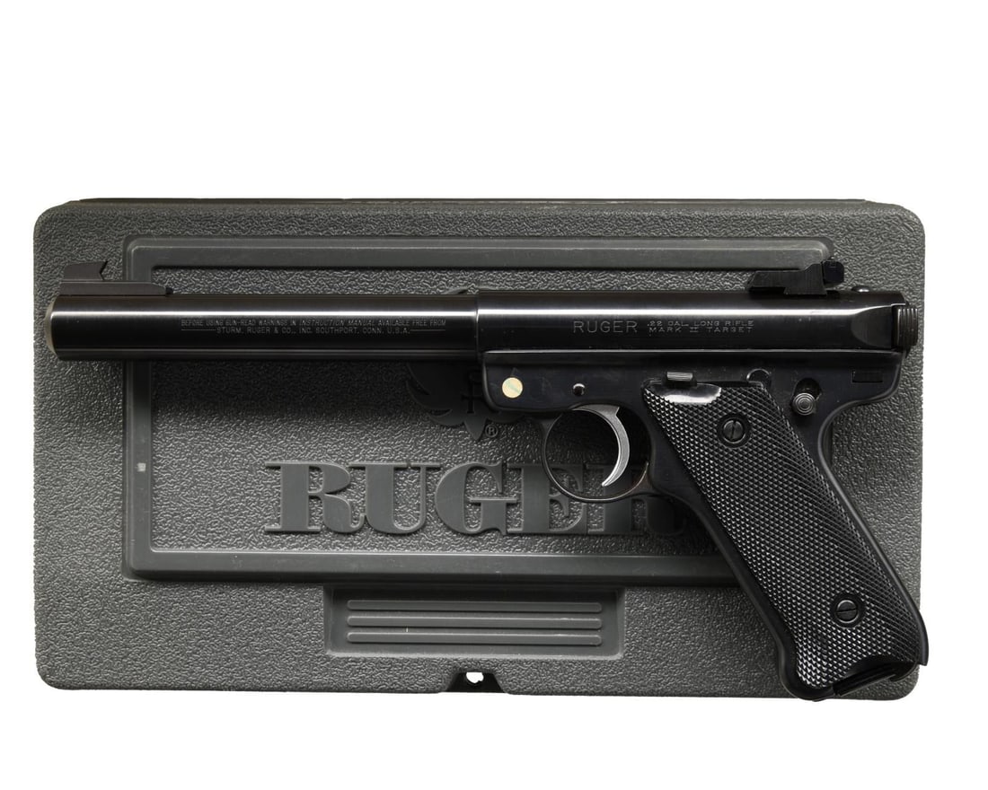 RUGER MARK II GOVERNMENT TARGET SEMI-AUTO PISTOL.: Cal. 22 LR. S# 224-15803. Bbl. 6 7/8" bull with screw attached ramped base undercut target sight plus receiver mounted adjustable rear. Mfg. 2000 as MK678G; blued Government Model 00175. Checkered bla