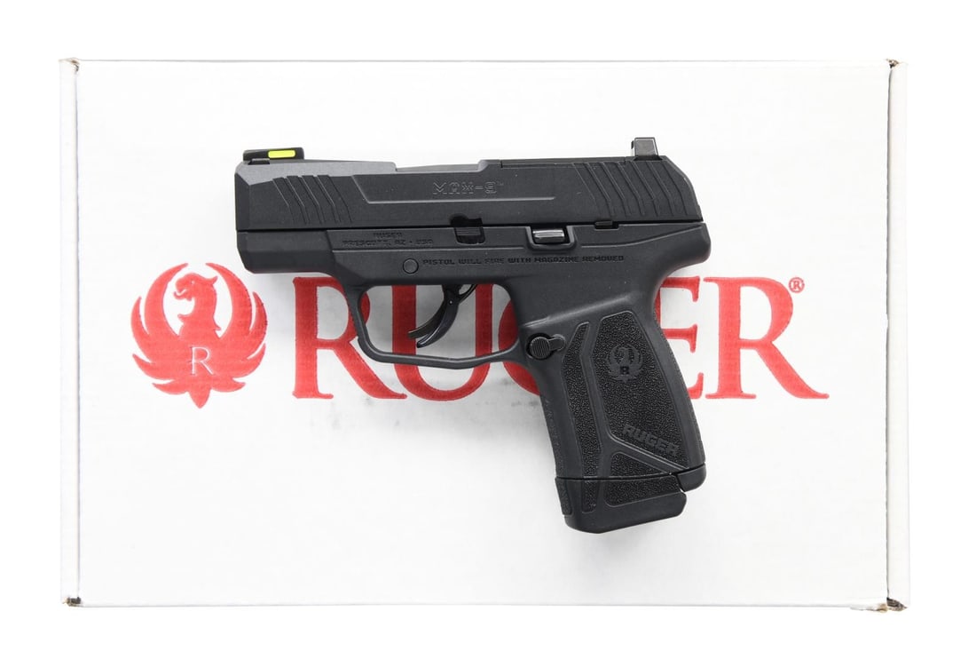 RUGER PRO MODEL MAX-9 SEMI-AUTO PISTOL.: Cal. 9mm Luger. S# 350018091. Bbl. 3.2". Mfg. 2021 in Prescott, AZ with black frame and black oxide metal finish. Striker fired Pro Model #03503 with trigger safety only. Slide has stylish front and r
