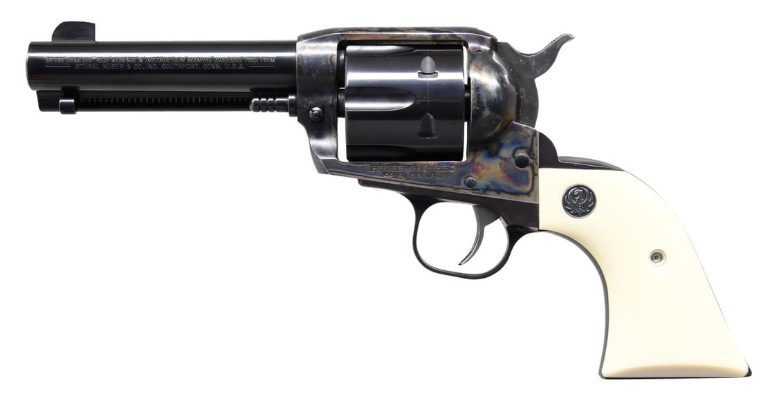 RUGER 44-40 OLD MODEL VAQUERO REVOLVER.: Cal. 44-40 Colt. S# 56-11747. Bbl. 4 5/8" with blade sight; frame notched rear sight. Mfg. 1996 (1993–2005) as Model 00560 (catalog number BNV-40-I), having a case-colored frame with a blued bal