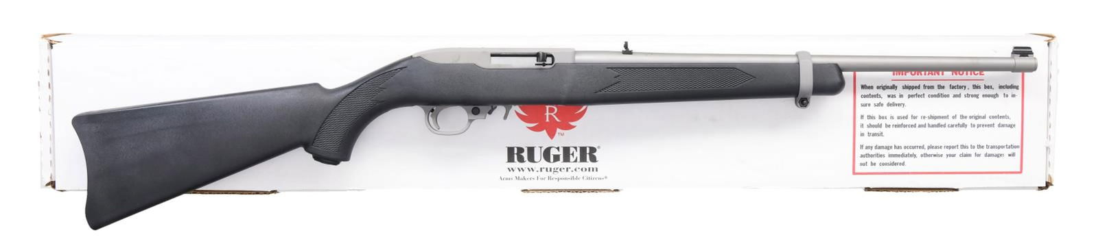 RUGER STAINLESS MODEL 10/22 SEMI-AUTO CARBINE.: Cal. 22 LR. S# 353-99532. Bbl. 18 1/2" with banded brass bead front sight plus folding leaf rear. Mfg. 2009 (1964 to date for all 10/22's) as matte stainless Model 01140; Catalog No. K10/22RPF. Black