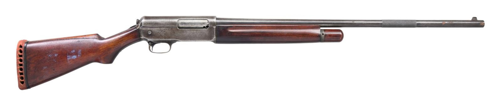 WINCHESTER MODEL 11 AUTO-LOADING SHOTGUN.: Cal. 12 ga. S# 39075. Bbl. 28" w/ fixed Mod choke. Winchester's first recoil operated auto-loading shotgun. Unusual operation system; bbl. had to be pushed back by knurled section to cycle action. Bro