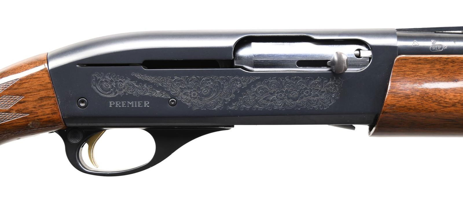 REMINGTON MODEL 11-87 PREMIER SEMI-AUTOMATIC: SHOTGUN. Cal. 20 GA, 2 3/4" or 3". S# TL000464. Bbl. 25 1/2". Model 11-87 Premier semi-automatic shotgun mfg. by Remington. The left side of the bbl. is marked with the cal. designation, with Remingto