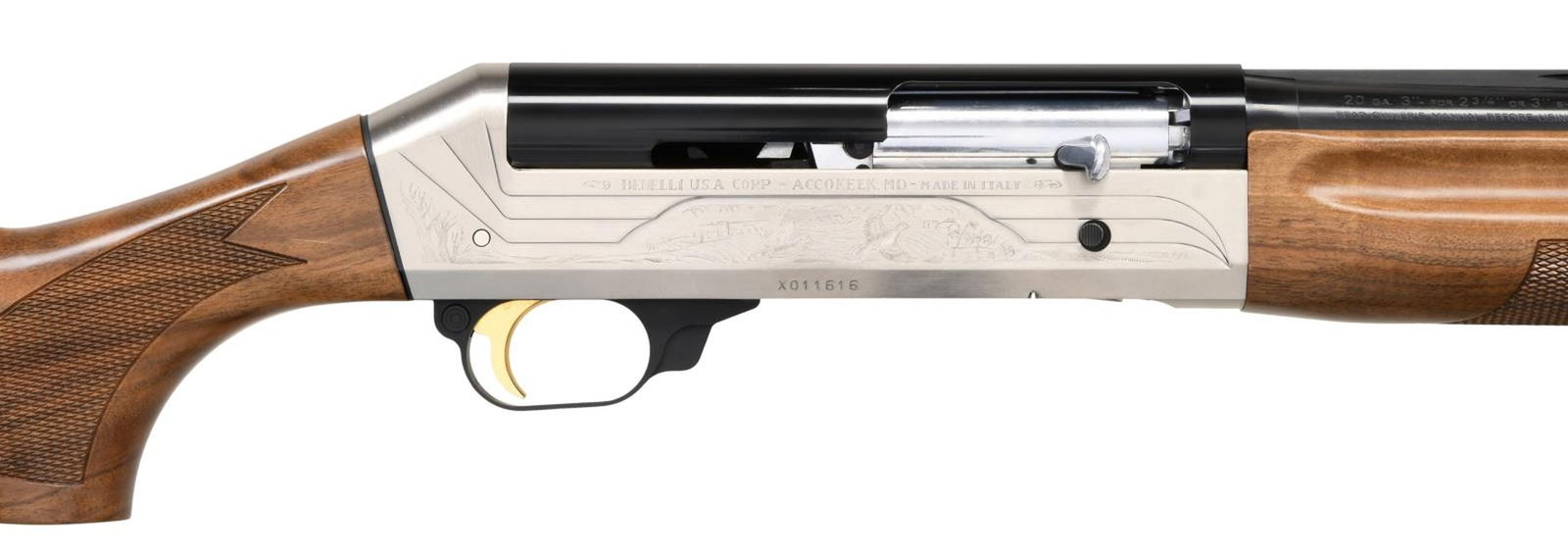 BENELLI LEGACY 20 GAUGE SEMI AUTO SHOTGUN.: Cal. 20 Ga., 3". S# X011616 (BU = 2004). Bbl. 26", VR choked IC. Red fiber optic front sight. Armi operating system. Brightly finished receiver with factory-engraved game scenes. Blued bbl. Gold trigg