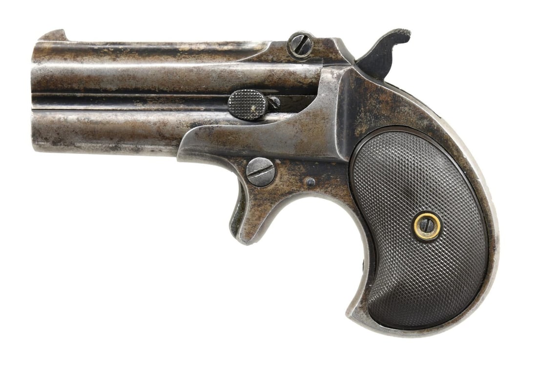 REMINGTON-UMC CO. 2ND VARIATION O/U DERRINGER.: Cal. 38 RF. L94379 (under left grip panel, mfg. 1911-1935). The 3" barrels have Remington - UMC address. Two piece hard rubber grips. CONDITION: metal has traces of original blue finish mixed with gra