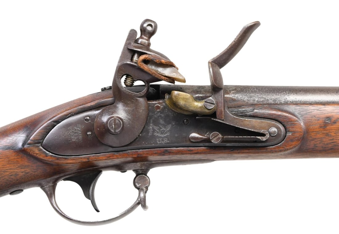 SPRINGFIELD MODEL 1816 RECONVERSION FLINTLOCK US: MUSKET. Cal. 69. NSN. Bbl. 42". Springfield marked lock & bbl. are dated 1837. 3 band fastened walnut stock w/ iron fittings. Left stock ear has partially visible cartouche. Button tipped iron ramrod.