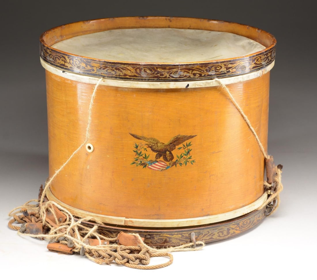 POST CIVIL WAR DRUM POSSIBLY FOR GAR USE.: This drum measures approx. 12” in height and 17” in diameter. It has stenciled gold decoration on the upper & lower hoops with an American eagle decal next to the certifiably antique ivory