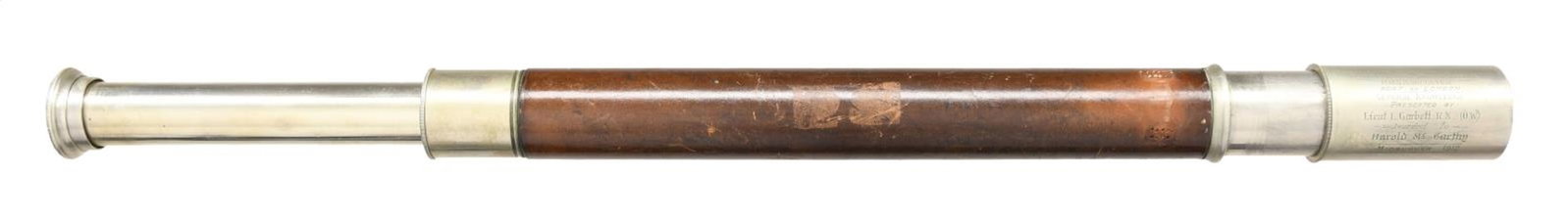 PRESENTATION SPYGLASS.: This fine English spyglass measures 17 1/2" collapsed and 25” extended. There is a cup-shaped leather cover over the sun shield that originally buckled to the leather covering of the shaft. The 