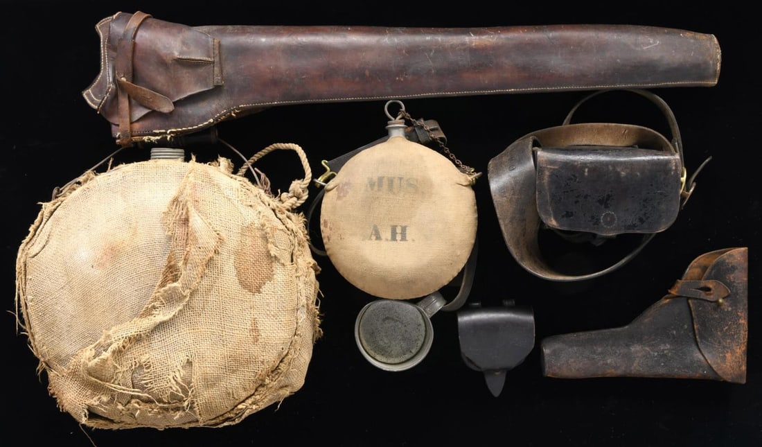 INDIAN WAR & CIVIL WAR ERA MISC LOT.: Lot includes fine Civil War cap box with crisp contractor & inspector's mark; 30" cowboy style carbine sleeve with straps to mount on saddle, fair; Indian war canteen with cover & leather strap with t