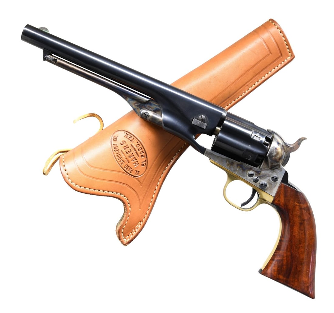 UBERTI FLUTED CYLINDER 1860 ARMY REVOLVER: Cal. 44. S# 130076 (BD = 1994). Round 8" barrel w/ blade front sight. 6 Shot fluted cylinder. Case hardened frame, hammer, loading lever, & plunger. Brass trigger guard. One piece walnut grip. UNATTAC