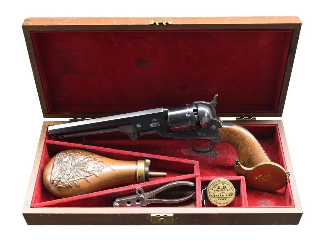 EIG 1851 NAVY REVOLVER.: Cal. 36. S# 6733. Bbl. 7 1/2". Brass post front sight. An Italian EIG-made 1851 Navy-style cap & ball revolver. Blued bbl. and cyl. Case-colored hammer & loading lever. Silver-plated frame, trigger gu