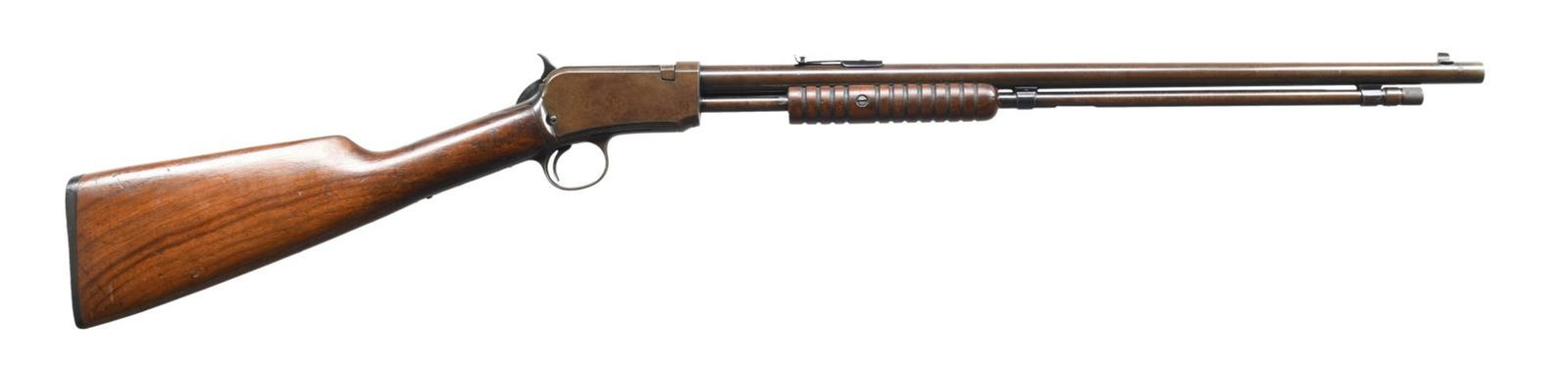 WINCHESTER 06 PUMP RIFLE.: Cal. 22 S, L, LR. S# 656164B. Bbl. 20", round with sporting sights. Tubular mag. Grooved slide handle with straight grip stock and wagon wheel buttplate. Mfg. 1926. CONDITION: metal has a faded brown 