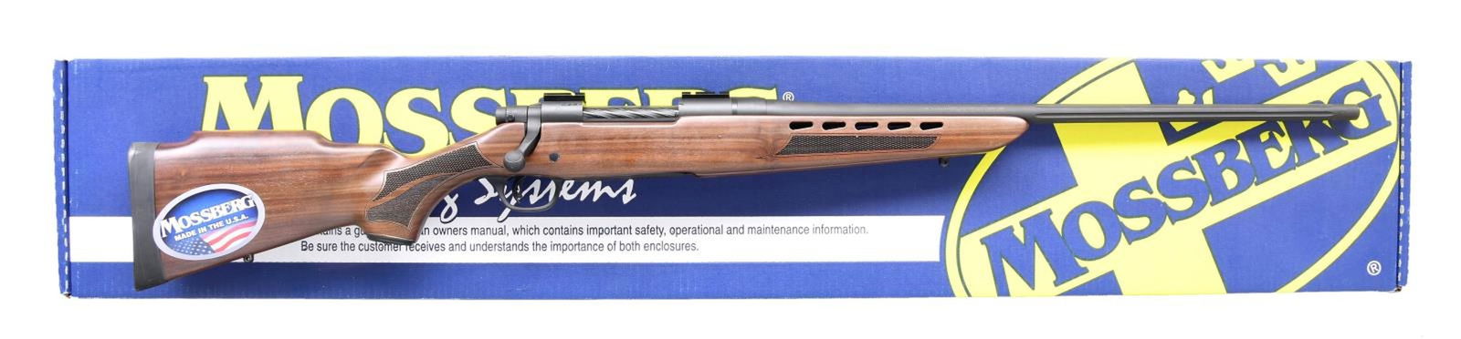 MOSSBERG 4X4 BOLT ACTION RIFLE WITH MATCHING: FACTORY BOX. Cal. 30-06. S# BA346247. Bbl. 24 1/4". 4X4 bolt action rifle mfg. by Mossberg. The left side of the half fluted bbl. is marked with the Mossberg trademark logo, followed by the model and