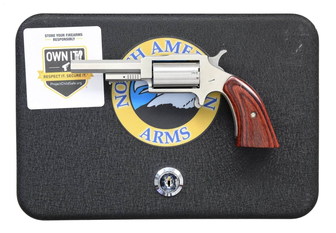 NORTH AMERICAN ARMS MODEL NAA-1860-250C SINGLE: ACTION REVOLVER. Cal. 22 Mag. S# SH1999. Bbl. 2 1/2". Model NAA-1860-250C single action revolver mfg. by North American Arms. Right side of frame is marked with NAA's mfg. information above the cal. d