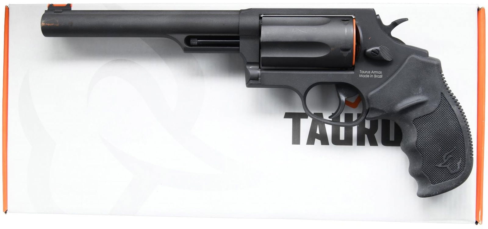TAURUS THE JUDGE DA REVOLVER.: Cal. 45 Colt/410. S# ADK795208. Bbl. 6 1/2". Fiber optic front sight. Fixed rear sight. 2 1/2" chambers. Matte black finish. Black rubber grips w/ Taurus logo. UNATTACHED ACCESSORIES: matching numbere