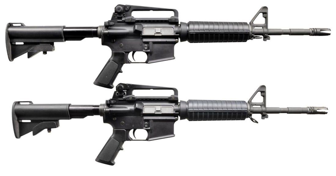 CONSECUTIVE PAIR PRE BAN BUSHMASTER XM15-E2S: RIFLES. Consecutive pair of very early pre-ban Bushmaster carbines. Rifle 1) Cal. 5.56 NATO. S# L000023. Bbl. 16". M4 profile threaded barrel terminated with a 4-prong Vortex-style flash hider. Protec