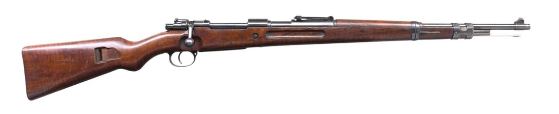 SCARCE REICHSPOST MARKED BANNER K MAUSER BOLT: ACTION RIFLE. Cal. 8mm Mauser. S# 68801. Bbl. 24". Blade front sight. Ladder rear sight graduated to 2000m. Matching numbers on the receiver, bbl. stock, rear sight base, bolt stop, trigger guard, & f