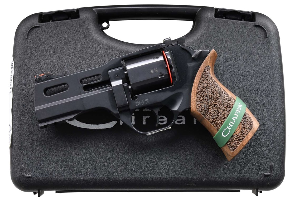 CHIAPPA RHINO 40 DS DA REVOLVER.: Cal. 9mm Luger. S# CFIT21N05336. Bbl. 4". Fiber optic sights w/ adjustable rear. 6-shot cyl. Matte black finish. Picatinny accessory rail on the underside of bbl. Walnut factory grips. UNATTACHED ACCE