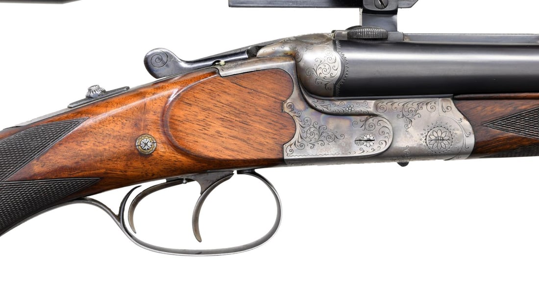 TH. PAULI GERMAN DRILLING.: Cal. 16 ga. 2 5/8". / 8mmX57R. S# 17432. Bbls. 23 3/4" of Krupp Fluid Steel. Bead front sight w/ folding leaf rear sight. Fixed full & full chokes. Rib is marked "Th. Pauli Nachf. Munster W.". Kahles 