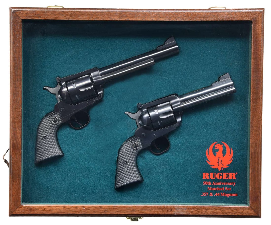 CASED SET OF RUGER 50th ANNIVERSARY BLACKHAWK: REVOLVERS; 357 & 44 MAGNUM. S# 520-12893, S# 870-12893. BOTH: Blued New Model Blackhawks with all steel construction to include ejector housings and grip frames. Checkered black plastic grips having b