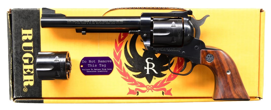 RUGER BUCKEYE SPORTS 38-40 / 10MM NM BLACKHAWK: CONVERTIBLE REVOLVER. Cal. 38-40 / 10mm Auto. S# 611-00148. Bbl. 6 1/2" with serrated ramped blade sight plus frame mounted adjustable rear. Mfg. 1990 only with Buckeye Sports bee at flower logo on to