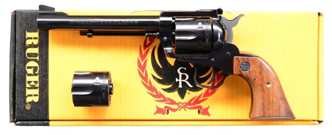 RUGER 38-40 / 10MM NM BLACKHAWK BUCKEYE SPORTS: CONVERTIBLE REVOLVER. Cal. 38-40 / 10mm Auto. S# 611-04652. Bbl 6 1/2" with ramped serrated blade sight plus cylinder frame mounted factory adjustable rear. Only 5,541 units manufacture in 1990 only (