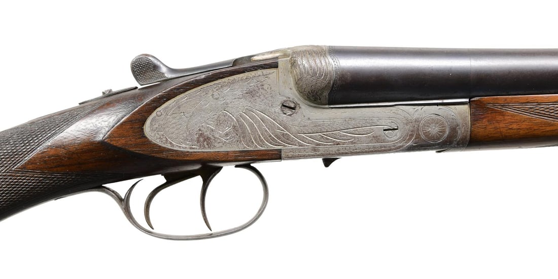 FRENCH J BERNIAUD ENGRAVED SIDELOCK SXS SHOTGUN.: Cal. 16 Ga. 2 1/2". S# 41668. The Mono-bloc 27" barrels have matte rib with front bead; top of barrels engraved "PARIS / SPORT". Fixed Mod chokes. Sidelocks have large engraved pheasants with wings en