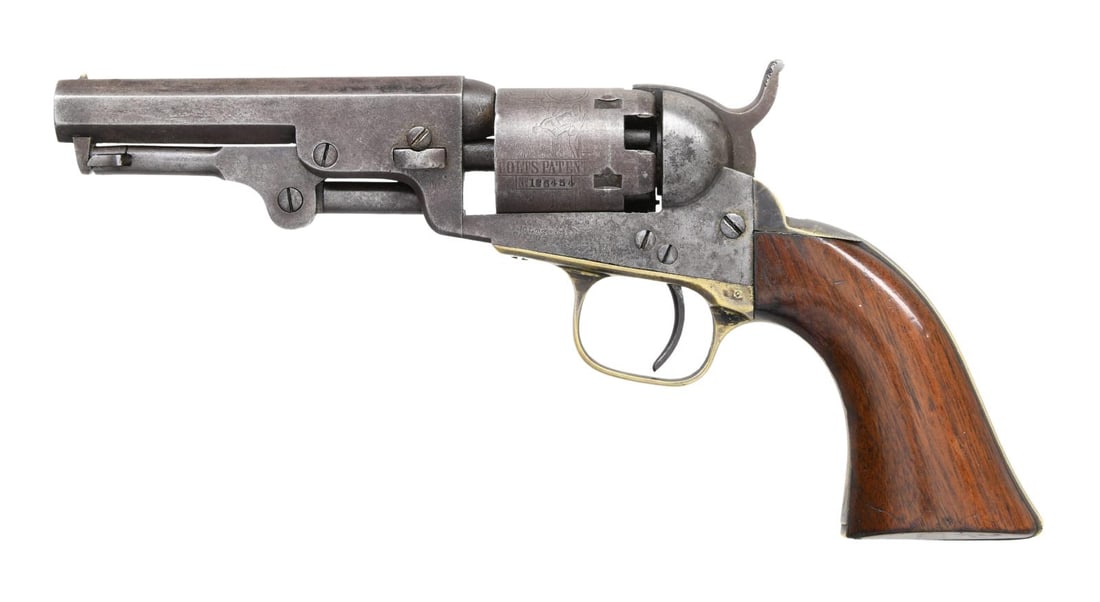 COLT 1849 POCKET MODEL INSCRIBED REVOLVER.: Cal. 31. S# 186454. Inscribed revolver mfg. in 1861 during the American Civil War. Backstrap is engraved w/ inscription "L. P. J. to W. N. M." who was likely a Civil War soldier. Bbl. 4" octagon w/ Ha